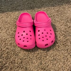 Pink crocs
